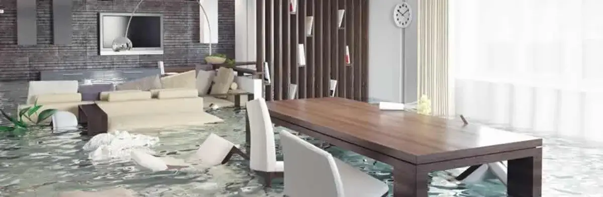 home interior affected by water damage with flooded floors and displaced furniture in Charleston, SC